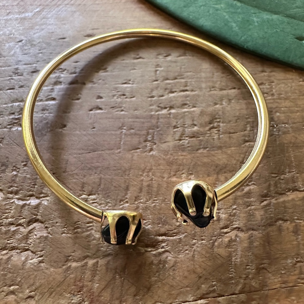 Elegant Gold and Black Bracelet